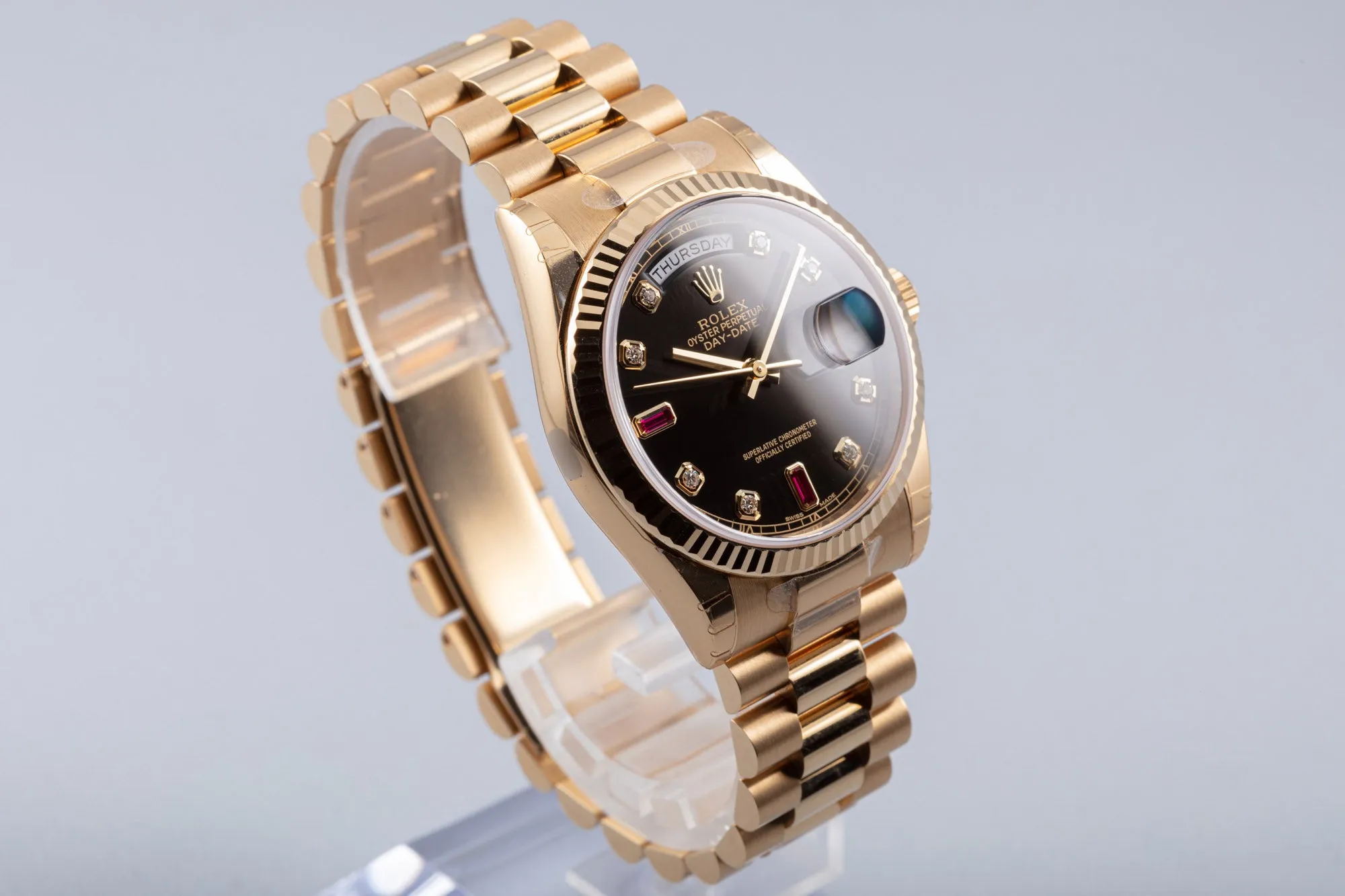 2018 Rolex 18k Day-Date Black Dial with Rubies & Diamonds