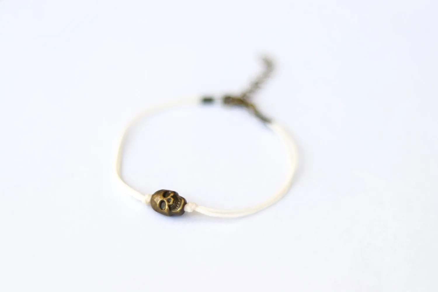 Bronze skull bead bracelet, beige string, gift for her, adjustable bracelet