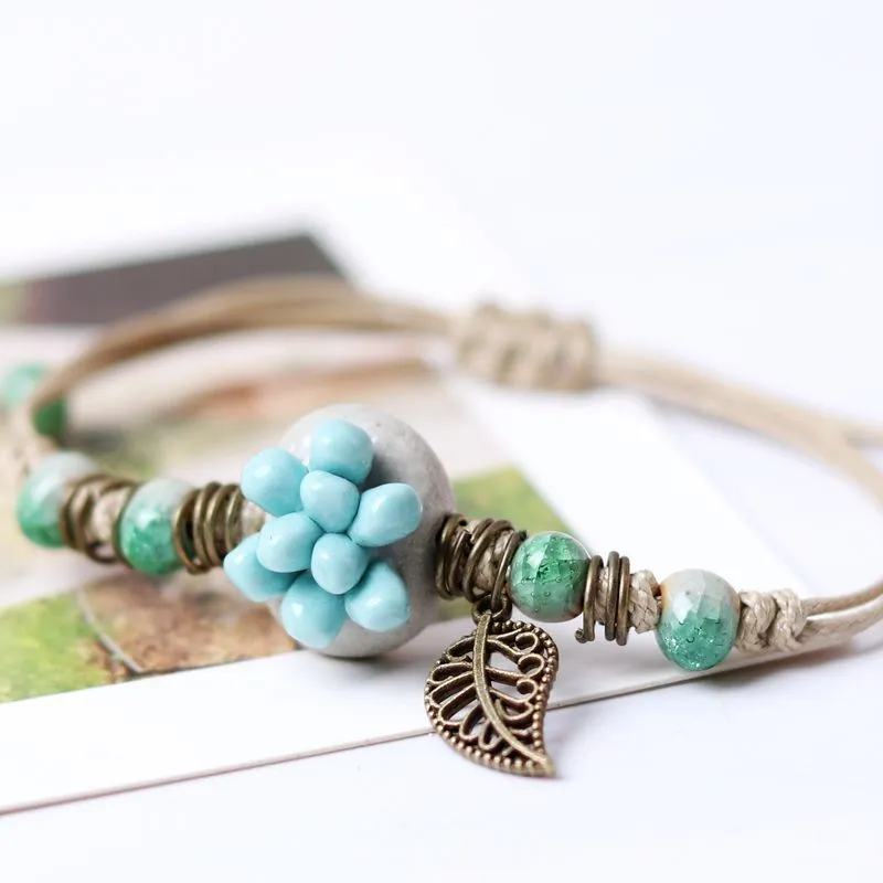 Small fresh pastoral style hand pinched four-leaf clover succulent Bracelet female summer trend female color clay bracelet beads five-color succulent flower