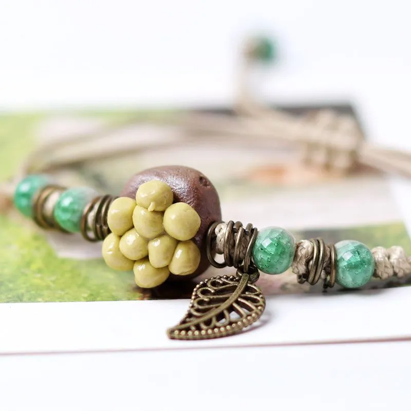 Small fresh pastoral style hand pinched four-leaf clover succulent Bracelet female summer trend female color clay bracelet beads five-color succulent flower